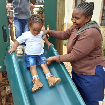 Esther with Creche child